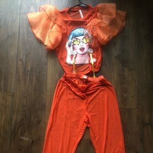 Two pierce orange pants suit $5